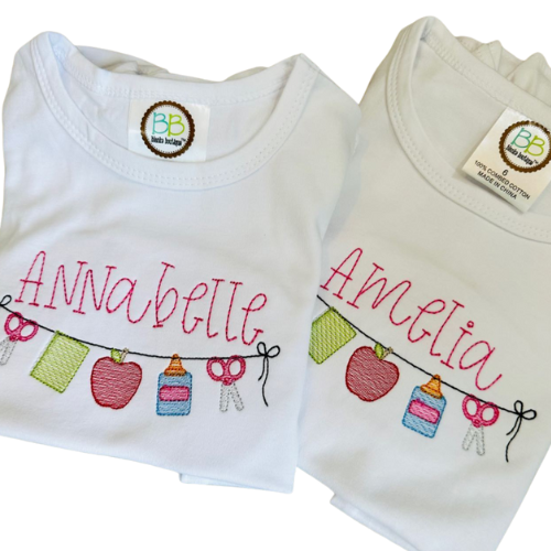 Two white baby rompers with embroidered names and colorful designs on a white background.