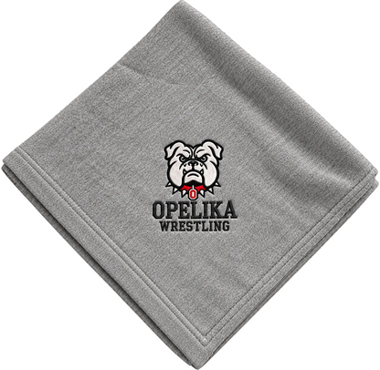 A folded gray t-shirt towel featuring the 'OPELIKA WRESTLING' bulldog logo in black, white, and red, shown on a transparent checkerboard background.